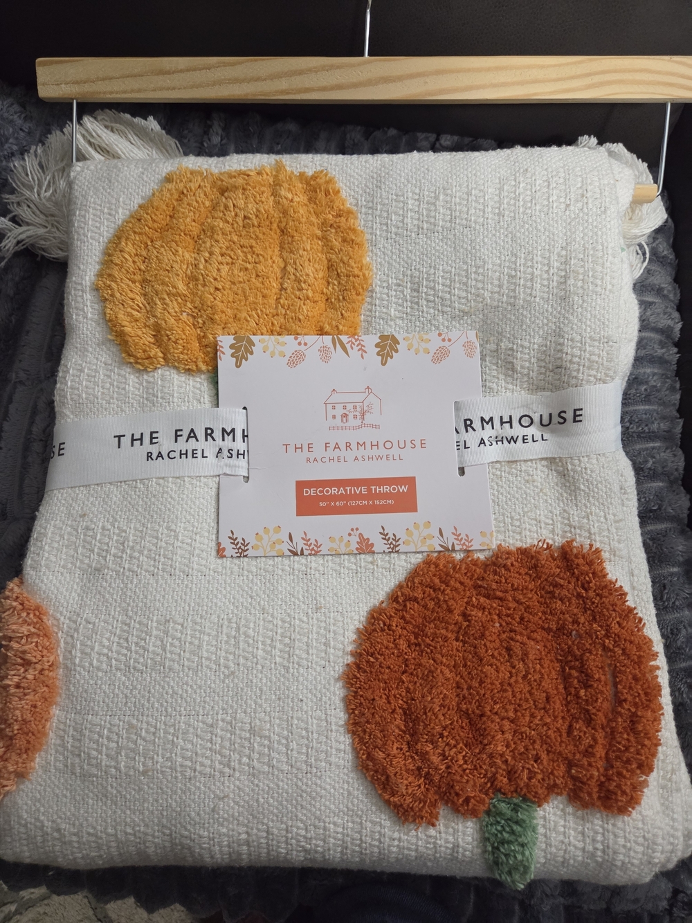 The Farmhouse Rachel Ashwell Cream Throw with Orange Pumpkin Motifs